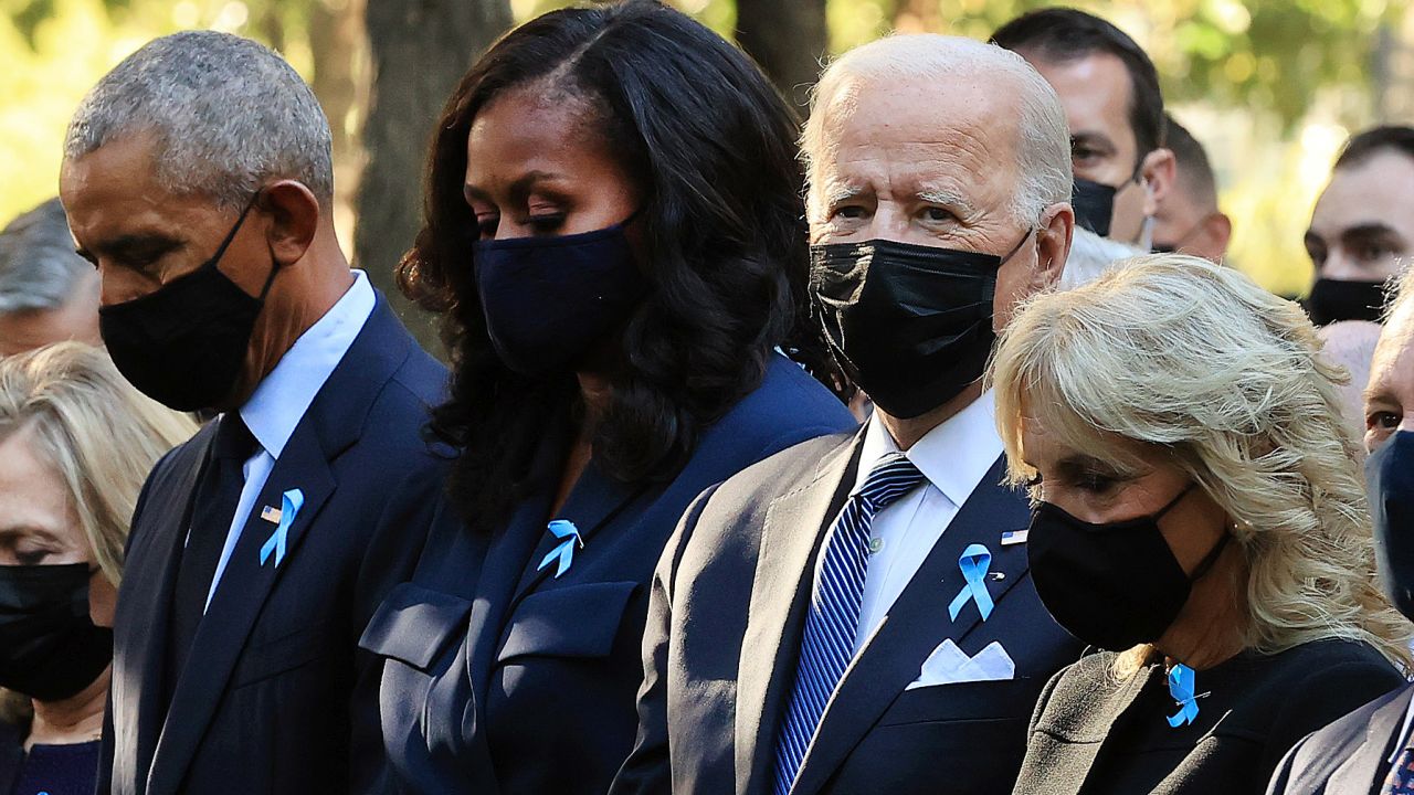 NEW YORK, NEW YORK - SEPTEMBER 11: (L-R) Former President Bill Clinton, former First Lady Hillary Clinton, former President Barack Obama, former First Lady Michelle Obama, President Joe Bien, First Lady Jill Biden, former New York City Mayor Michael Bloomberg, Bloomberg's partner Diana Taylor and Speaker of the House Nancy Pelosi (D-CA) participate in a moment of silence during the annual 9/11 Commemoration Ceremony at the National 9/11 Memorial and Museum on September 11, 2021 in New York City. During the ceremony six moments of silence were held, marking when each of the World Trade Center towers was struck and fell and the times corresponding to the attack on the Pentagon and the crash of Flight 93. The nation is marking the 20th anniversary of the terror attacks of September 11, 2001, when the terrorist group al-Qaeda flew hijacked airplanes into the World Trade Center, Shanksville, PA and the Pentagon, killing nearly 3,000 people. (Photo by Chip Somodevilla/Getty Images)