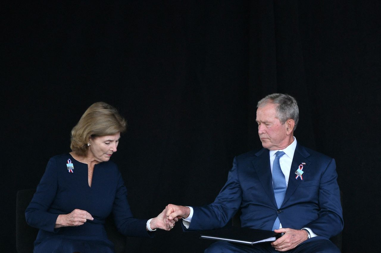 Former President George W. Bush and former first lady Laura Bush hold hands during the ceremony near Shanksville. "In the weeks and months following the 9/11 attacks, I was proud to lead an amazing, resilient, united people," Bush said.