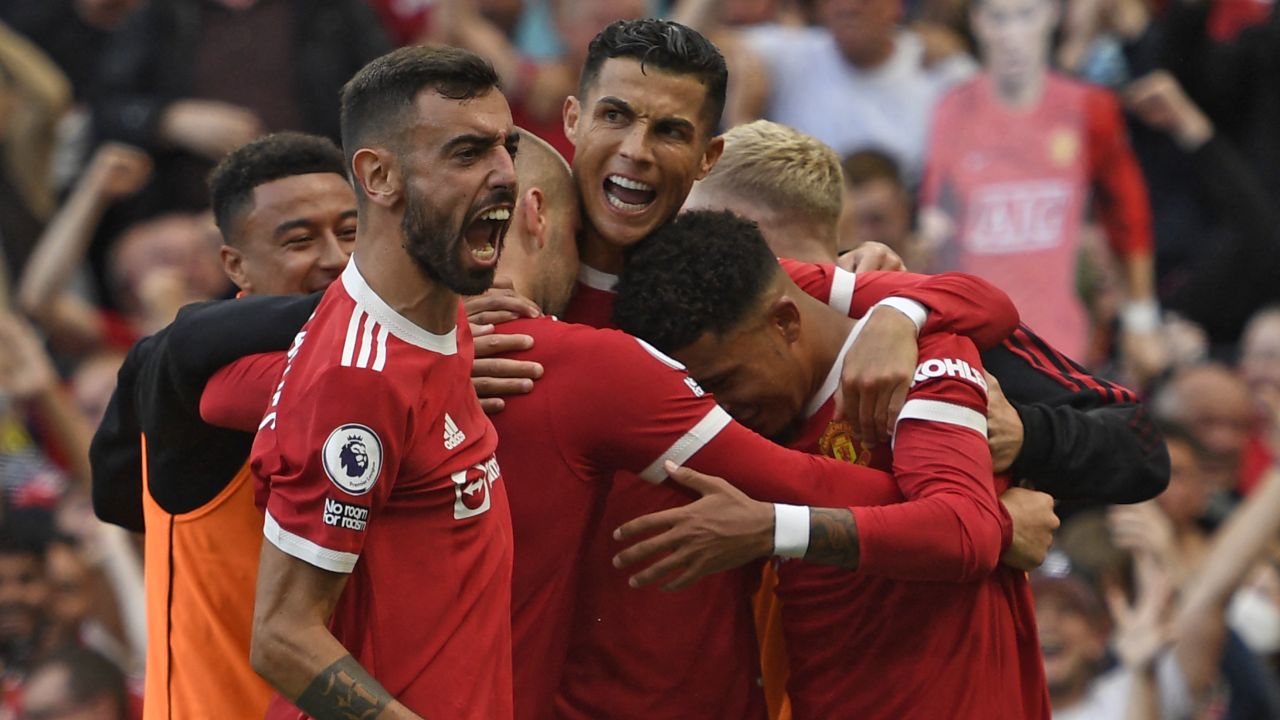 Ronaldo celebrates with teammates after scoring.