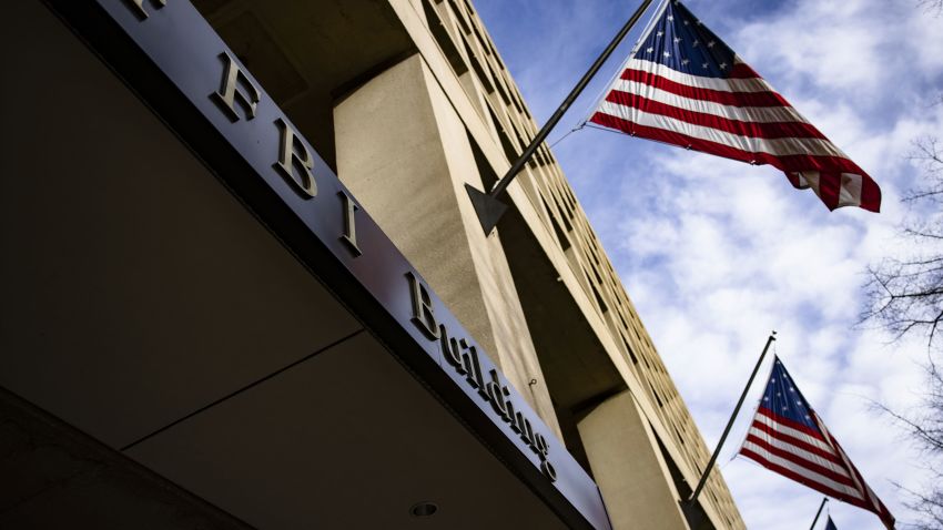 American flags fly outside the Federal Bureau of Investigation (FBI) headquarters in Washington, D.C., U.S., on Saturday, Jan. 2, 2021. A group of 11 Republican senators is pledging to oppose certification of President Donald Trumps election loss, rejecting leadership who warned against attempts to undermine the election or risk splintering the party. Photographer: Samuel Corum/Bloomberg via Getty Images
