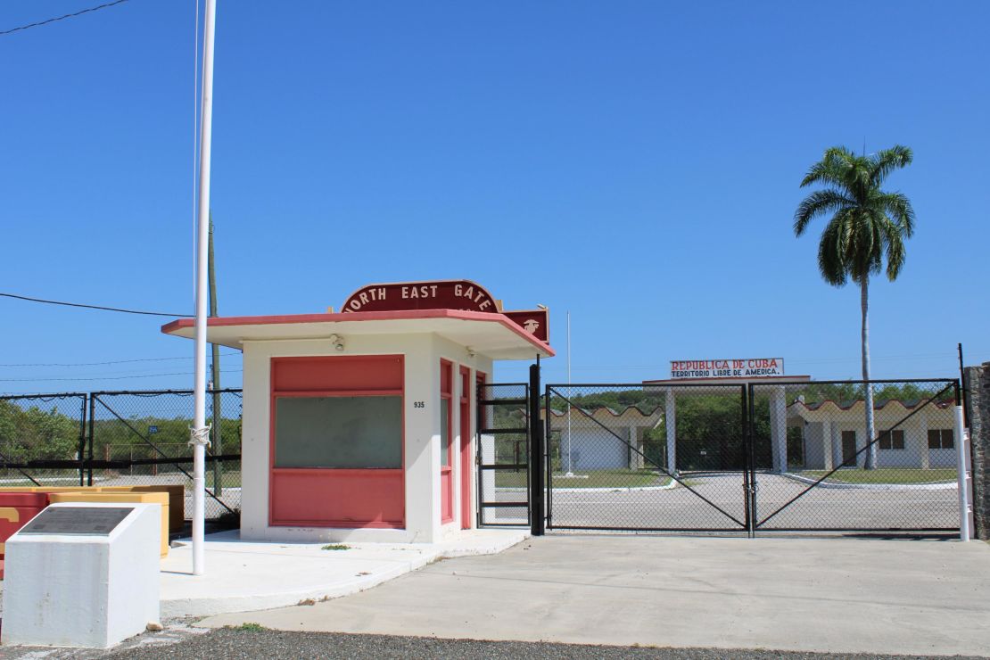 The gate between US Naval Station Guantánamo Bay and mainland Cuba. The North East Gate as its known is manned by US Marine Corps soldiers. The gate remains closed, but Cuba and the US have monthly "fence line" meetings on both sides of the gate, switching off who hosts each month.
