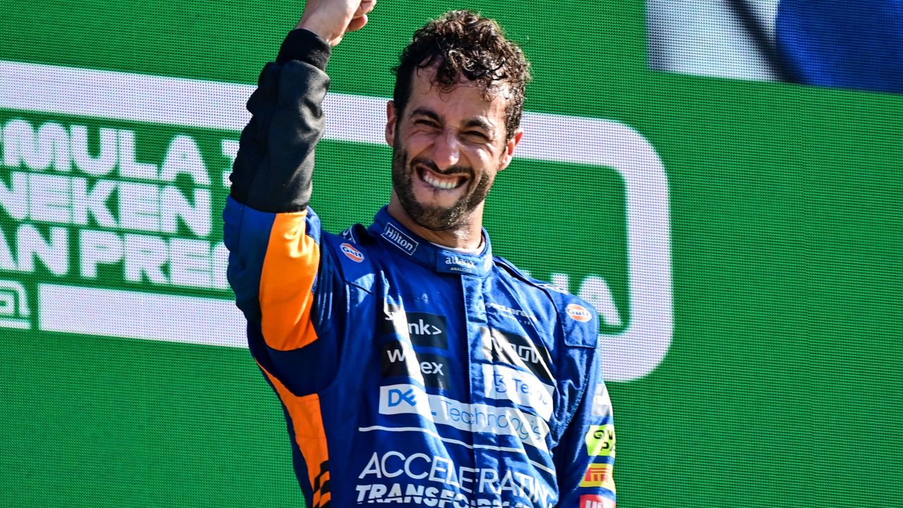 Ricciardo celebrates on the podium after winning the Italian GP.