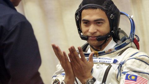 Sheikh Muszaphar Shukor, Malaysia's first astronaut, shown taking part in a farewell ceremony at the Baikonur cosmodrome, in Kazakhstan, on October 10, 2007 before lifting off for the International Space Station with Russian cosmonaut Yury Malenchenko and American Peggy Whitson. 