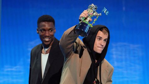 Giveon and Justin Bieber accept the award for Best Pop. Bieber was also awarded Artist of the Year.