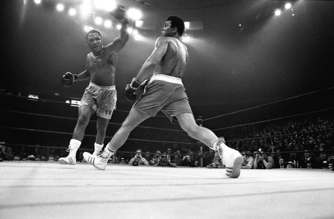 Muhammad Ali evades a punch from Joe Frazier during "The Fight of the Century" at Madison Square Garden in New York, March 8, 1971.