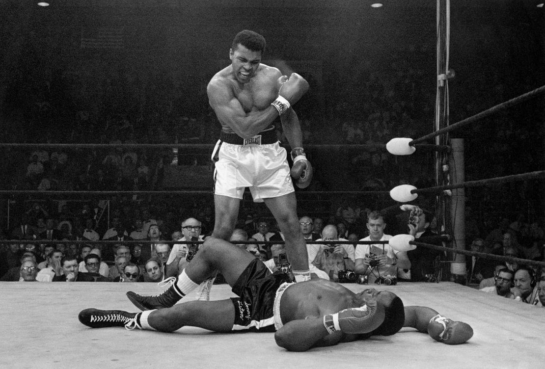 Muhammad Ali stands over Sonny Liston after dropping Liston with a short hard right on May 25, 1965. 