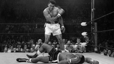 Ali stands over the fallen Sonny Liston, shouting and gesturing on May 25, 1965 in one of history's most iconic sport images.