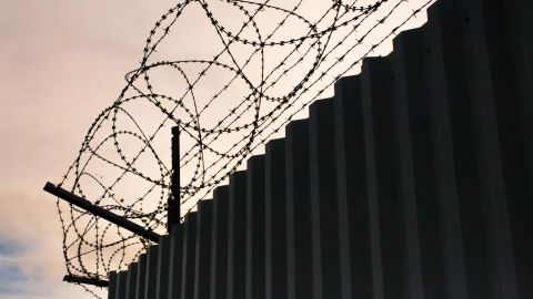 prison barb wire fencing STOCK
