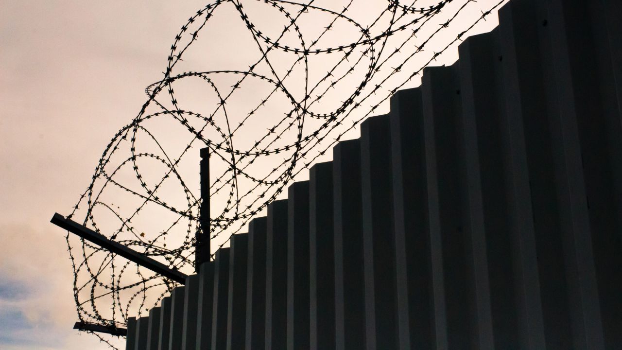 prison barb wire fencing STOCK