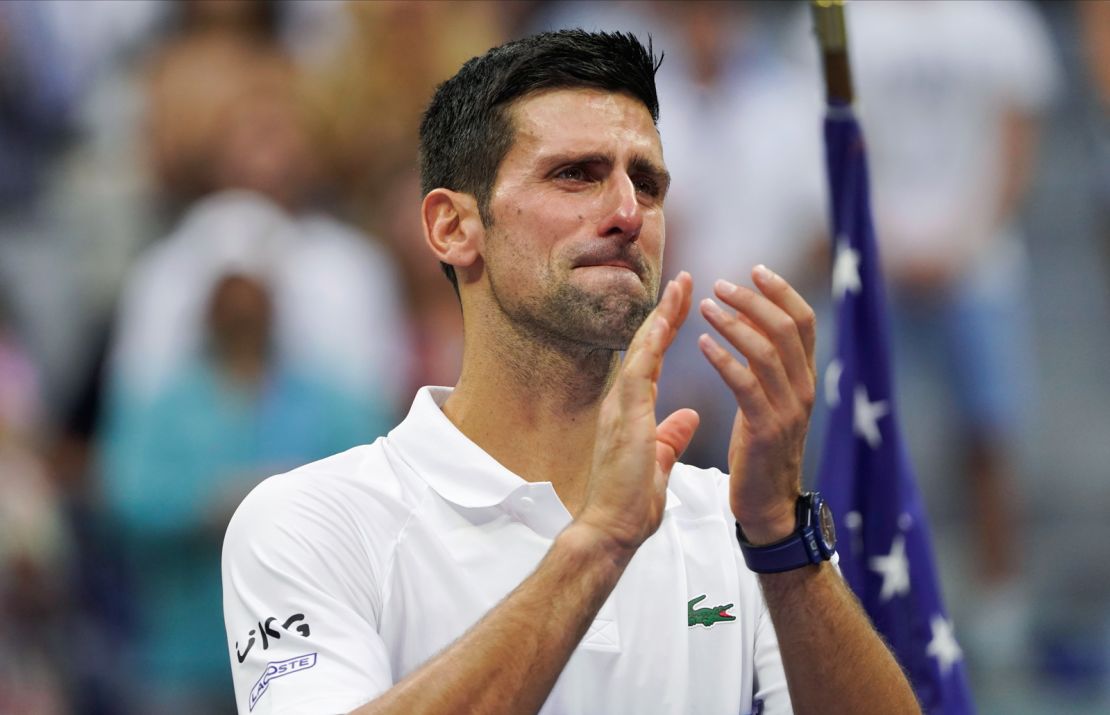 Djokovic reacts tearfully after falling short in his bid to win a 21st grand slam title. 