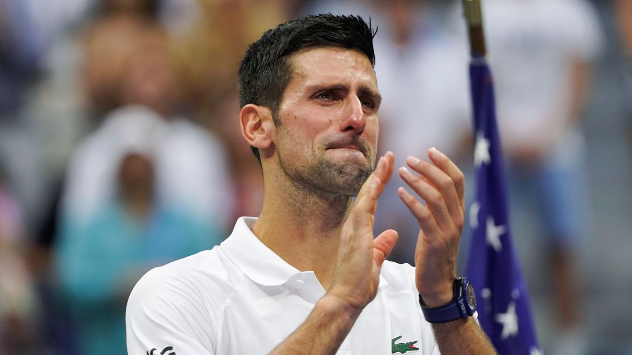 Djokovic reacts tearfully after falling short in his bid to win a 21st grand slam title.