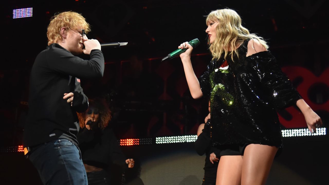 Taylor Swift and Ed Sheeran, seen here performing onstage at the Z100's Jingle Ball 2017 in New York.  
