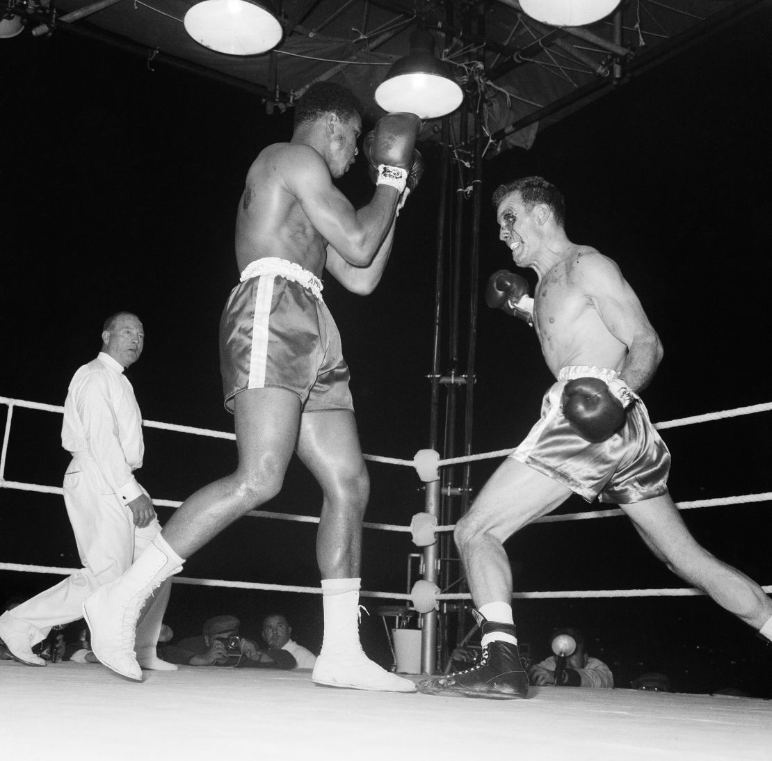 Cassius Clay fights Henry Cooper at Wembley Stadium, London on June 18, 1963.