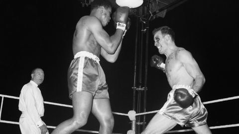 Cassius Clay fights Henry Cooper at Wembley Stadium, London on June 18, 1963.