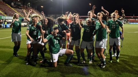 Northern Ireland celebrate after winning 2-0 against Ukraine in the UEFA Women's Euro 2022 play-offs in Belfast on April 13, 2021.