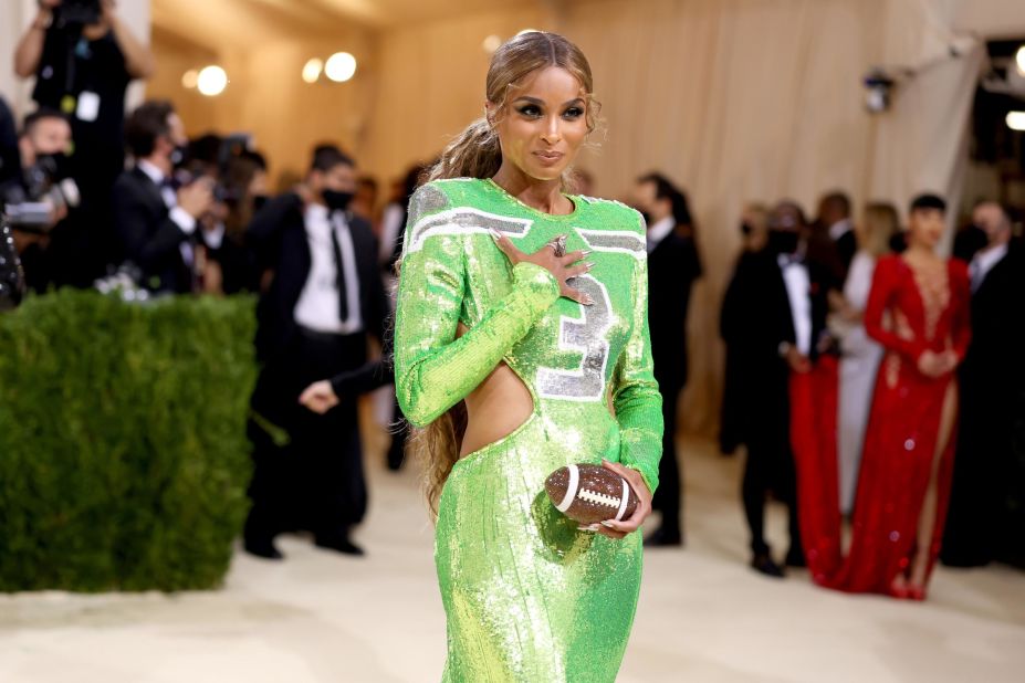 Long-time Met Gala attendee Ciara wore an American football-inspired outfit by Dundas. The neon green sequined dress featured cut outs as well as the number 3, a reference to her husband Seahawks quarterback Russell Wilson. Naturally, she accessorized with a glittering football clutch.