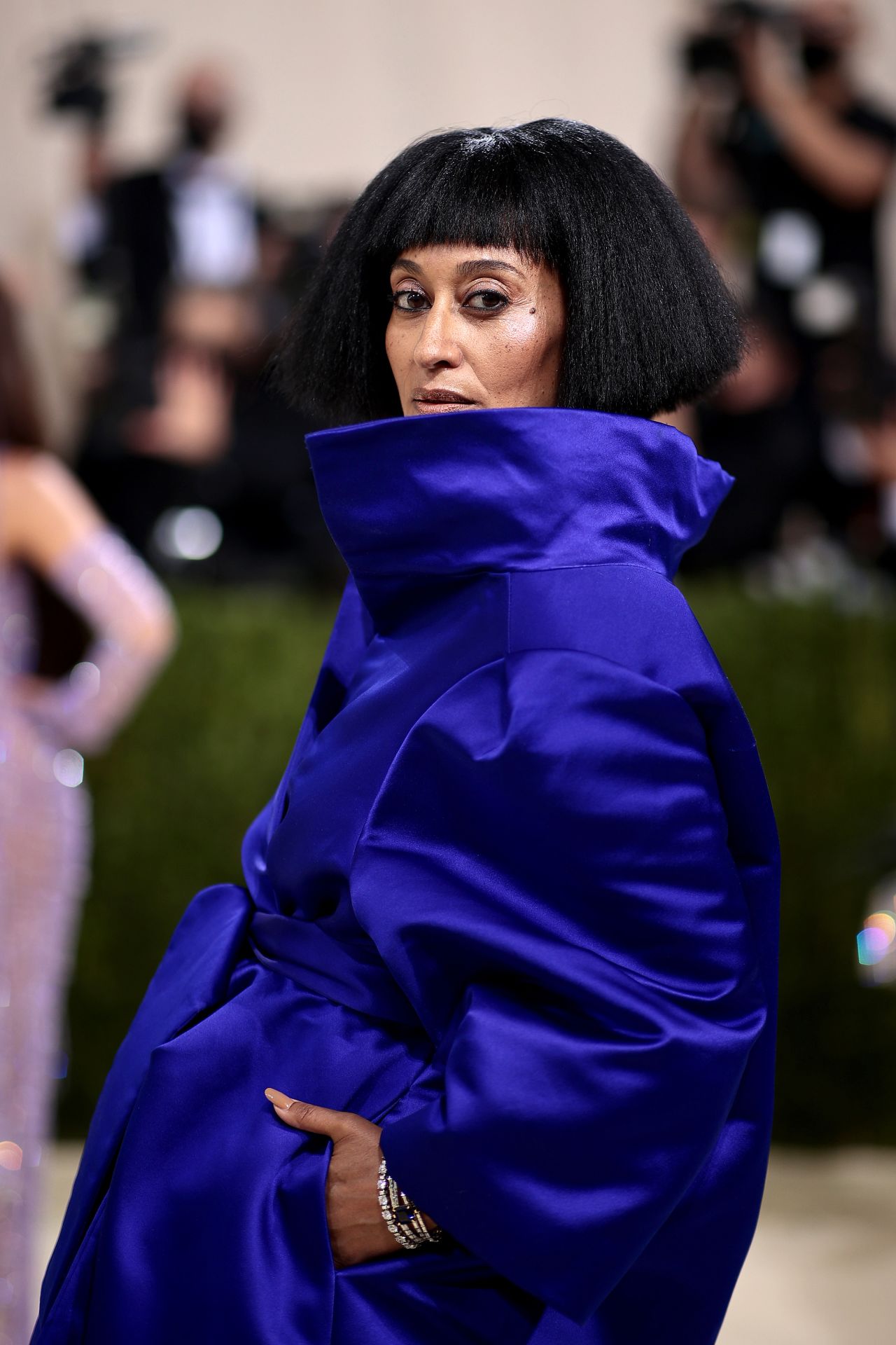 "Black-ish" actor Tracee Ellis Ross electrified the carpet in this vibrant blue Balenciaga couture coat-dress, which featured a popped collar and oversized silhouette. While speaking to Keke Palmer on a Vogue livestream, she revealed she drew inspiration from her mother Diana Ross' film "Mahogany."