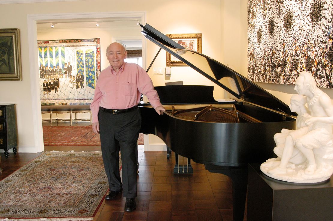 George Wein poses at his New York apartment in 2004.