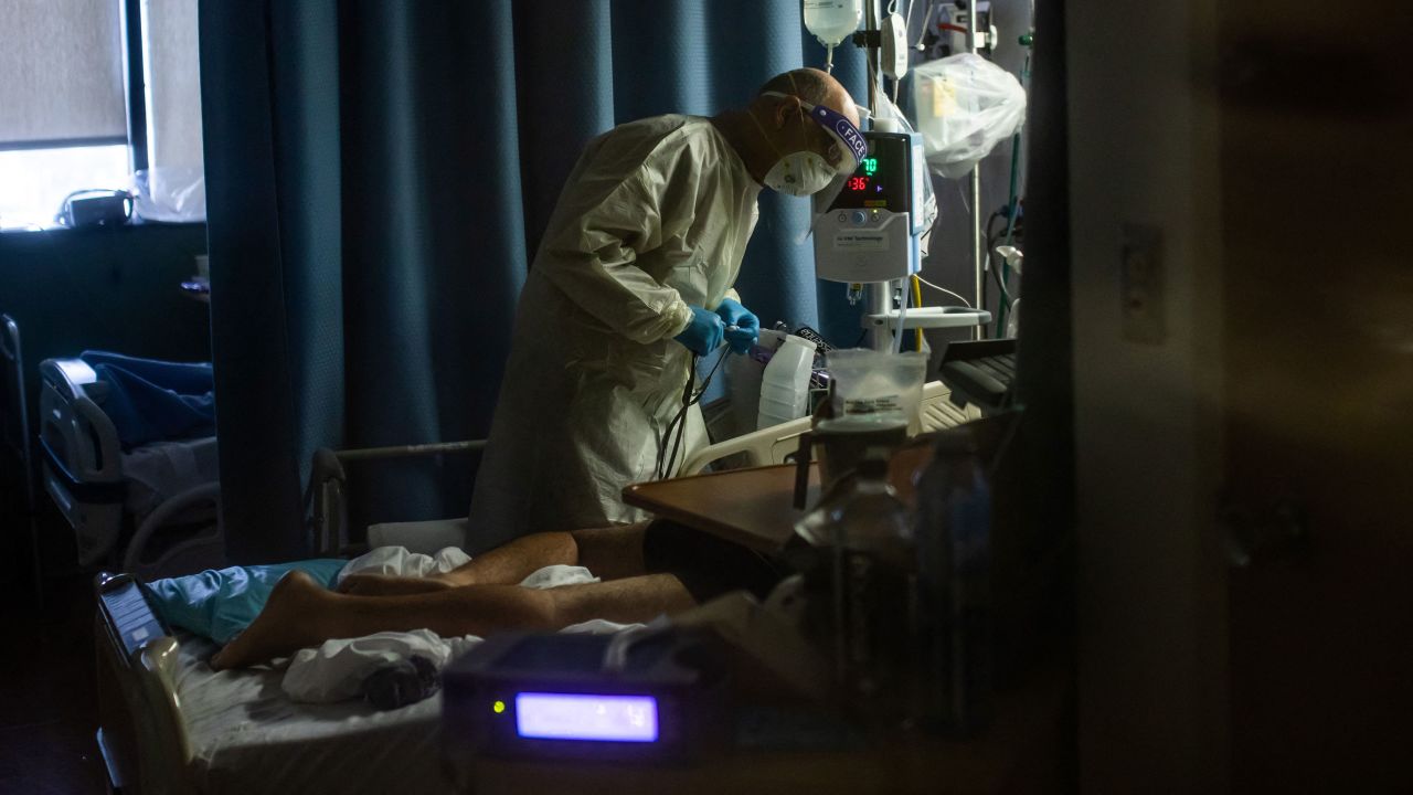 A doctor checks on an unvaccinated Covid-19 patient at Providence Cedars-Sinai Tarzana Medical Center in Tarzana, California on September 2, 2021.