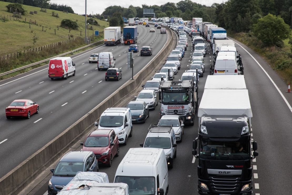 A traffic jam on the M25 motroway in Godstone, England, after climate activists blocked a slip road to push the UK government to legislate for stronger emissions cuts, on September 13, 2021.