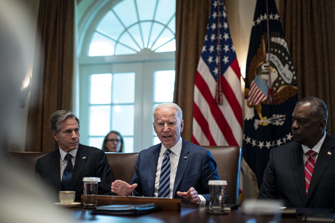 President Joe Biden speaks as Antony Blinken, secretary of state, left, and Lloyd Austin,  secretary of defense, right, listen during a cabinet meeting at the White House, July 20, 2021. 