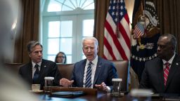 President Joe Biden speaks as Antony Blinken, secretary of state, left, and Lloyd Austin, secretary of defense, right, listen during a cabinet meeting at the White House, July 20, 2021. 