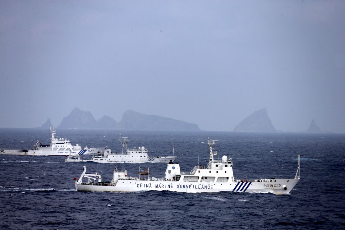China Marine Surveillance vessels (front and middle) cruise with a Japan Coast Guard ship near Kitakojima and Minamikojima of the disputed Senkaku Islands on April 23, 2013.