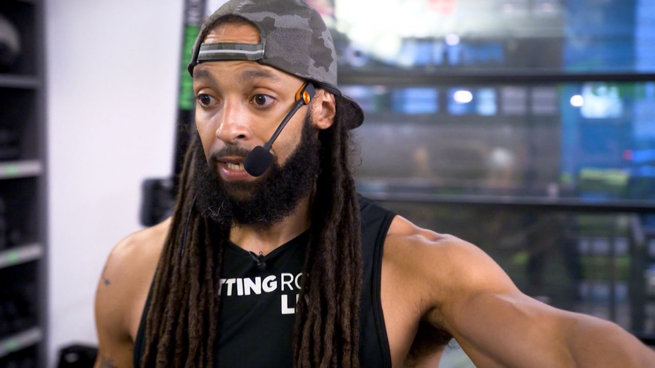 Sports psychologist and fitness instructor Carlos Davila says holding classes in public spaces is one way gyms and studios can connect with new clients from diverse communities.