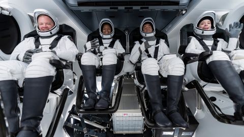 From left, Chris Sembroski, Sian Proctor, Jared Isaacman and Hayley Arceneaux sit in the Dragon capsule at Cape Canaveral in Florida on Sept. 12, 2021 during a dress rehearsal for the upcoming launch. 