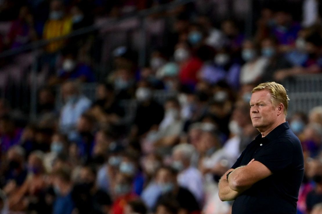 Dutch coach Koeman watches on during his side's 3-0 defeat.