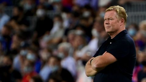 Dutch coach Koeman watches on during his side's 3-0 defeat.