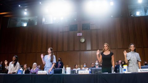 United States gymnasts from left, Simone Biles, McKayla Maroney, Maggie Nichols, and Aly Raisman are sworn in to testify during a Senate Judiciary hearing about the Inspector General's report on the FBI's handling of the Larry Nassar investigation.