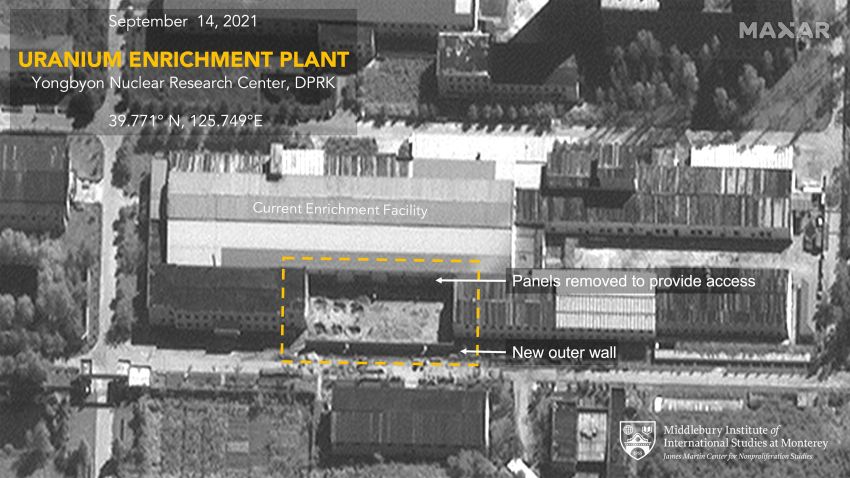 A satellite image taken on September 1, 2021 shows that North Korea cleared trees and prepared the ground for construction. A construction excavator is also visible in this image. In a second image taken on September 14, 2021, North Korea erected a wall to enclose the area, began work on a foundation, and removed panels from the side of the enrichment building to provide access to the newly enclosed area.