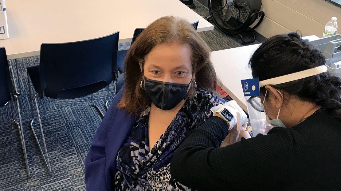 Robeson Community College President Melissa Singler receives the flu vaccination during the joint Covid-19/flu clinic held at the college. 