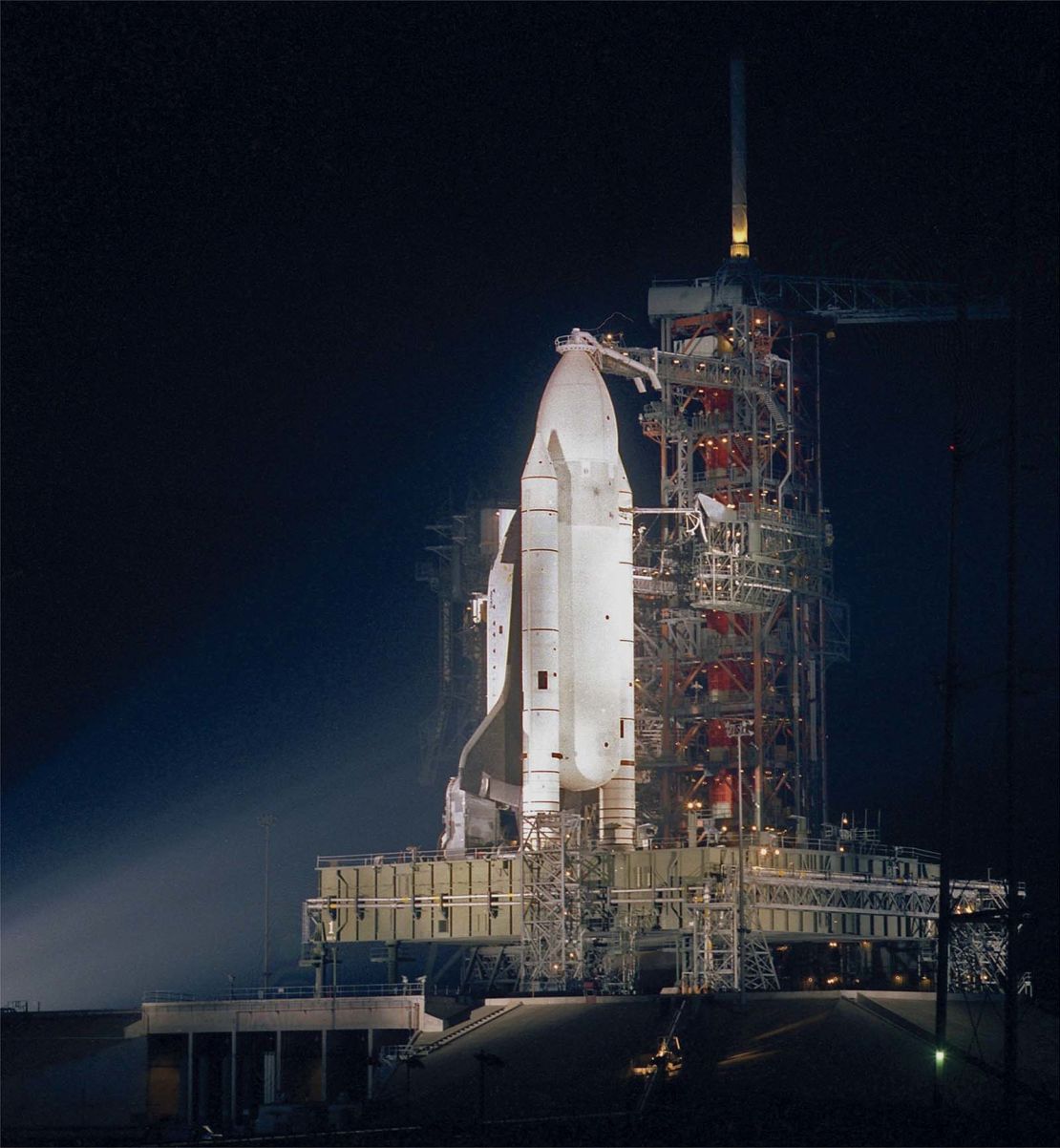 STS-2 on the evening of November 11, 1981. It was the last time the shuttle would launch with a white external tank; the paint was removed for later flights to avoid unnecessary weight. 