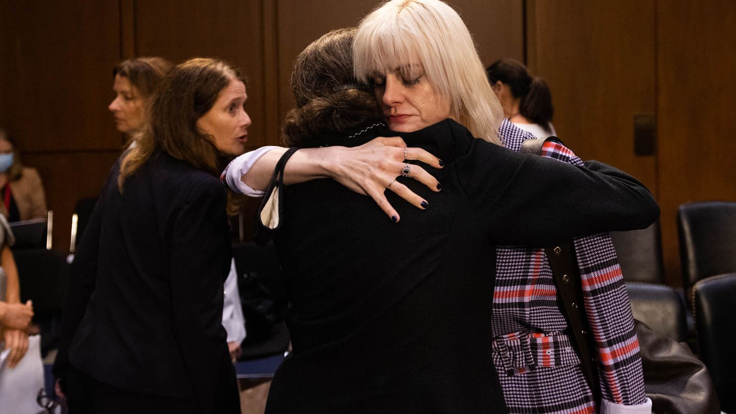 Sen. Dianne Feinstein, a California Democrat, embraces former US gymnast Jessica Howard, after a Senate Judiciary hearing about the Inspector General's report on the FBI handling of the Larry Nassar investigation of sexual abuse of Olympic gymnasts, on Capitol Hill, September 15, 2021, in Washington, DC. 