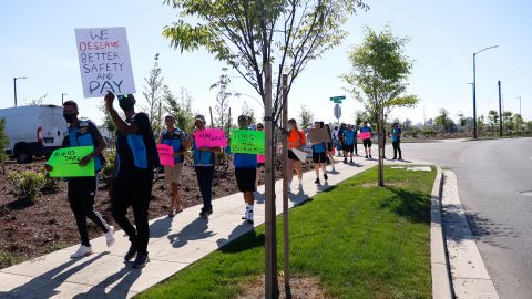 Drivers for Amazon DSPs protest outside a Amazon delivery station in Portland, Oregon this June.
