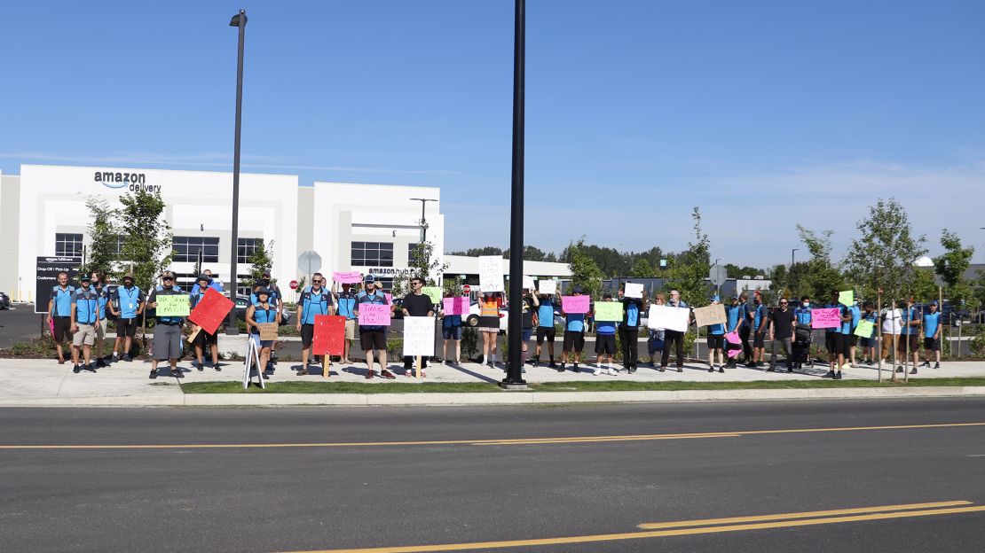 Drivers for Amazon DSPs protest outside a Amazon delivery station in Portland, Oregon this June.