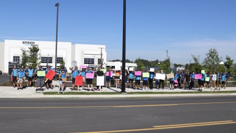 Drivers for Amazon DSPs protest outside a Amazon delivery station in Portland, Oregon this June.
