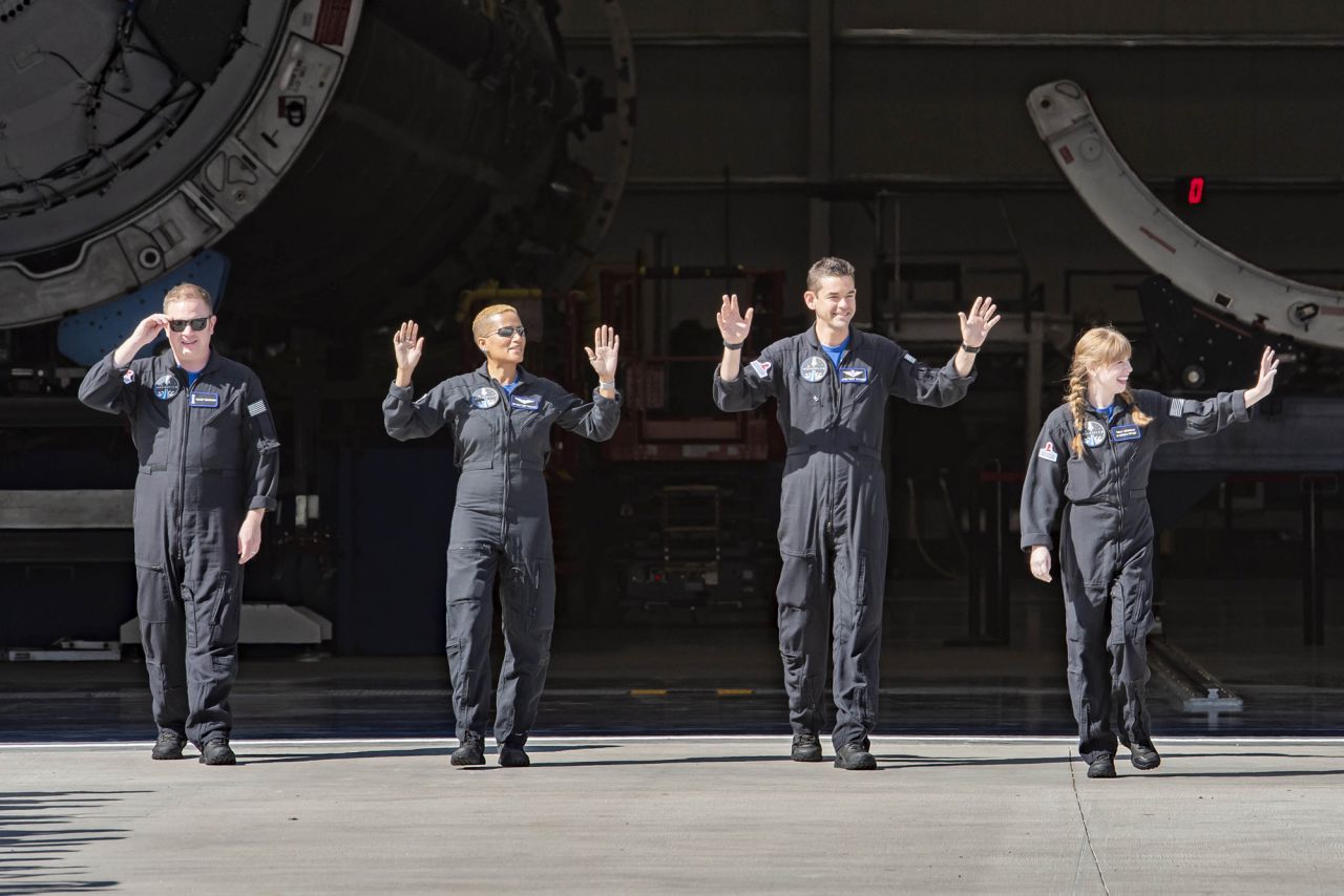 From left, Sembroski, Proctor, Isaacman and Arceneaux wave before suiting up to board the spacecraft.