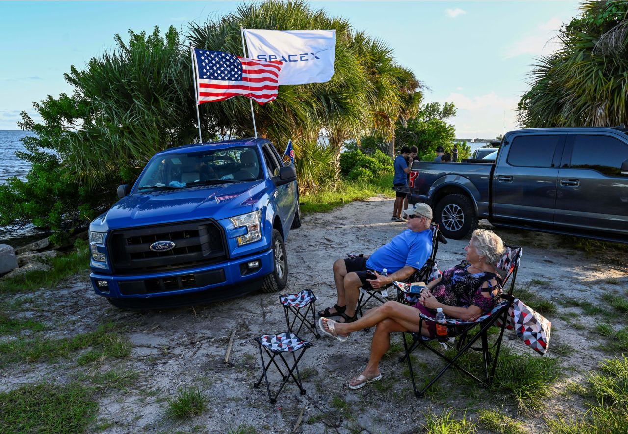 David and Nora Thurman wait to watch the launch along the Indian River Lagoon in Titusville, Florida. 