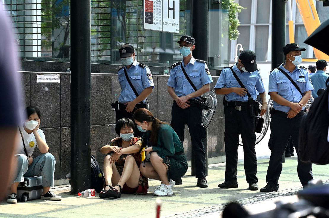 People gathering at Evergrande's headquarters in Shenzhen on Wednesday.