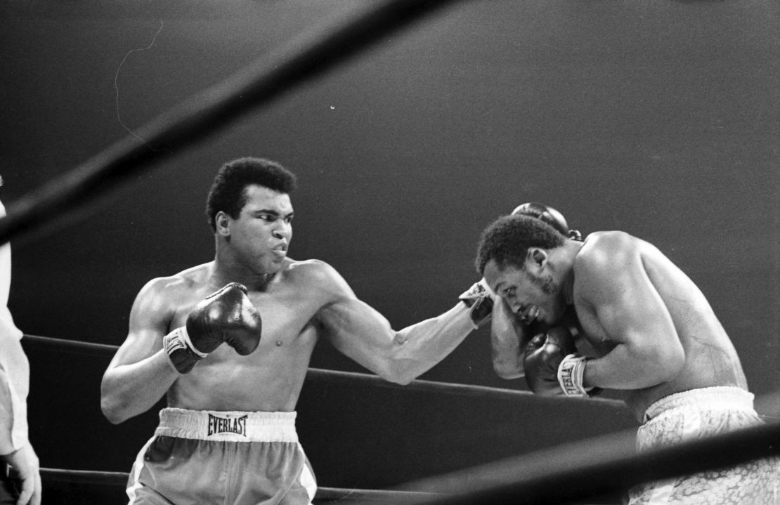 Ali lands a left hook on Joe Frazier during their fight at Madison Square Garden on March 8, 1971.