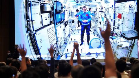 Astronauts in the Tiangong space station on video call with researchers on Earth via video link on September 3.
