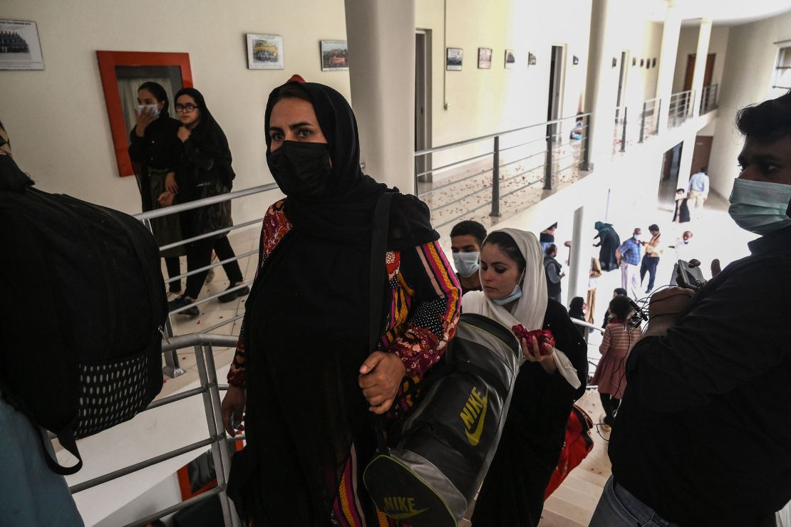 Members of Afghanistan's national girls football team arrive at the Pakistan Football Federation (PFF) in Lahore on September 15.