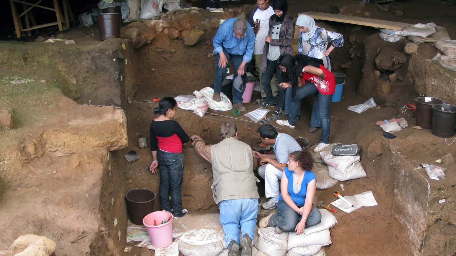 Archaeologists excavate Contrebandiers Cave, Morocco, in 2009.