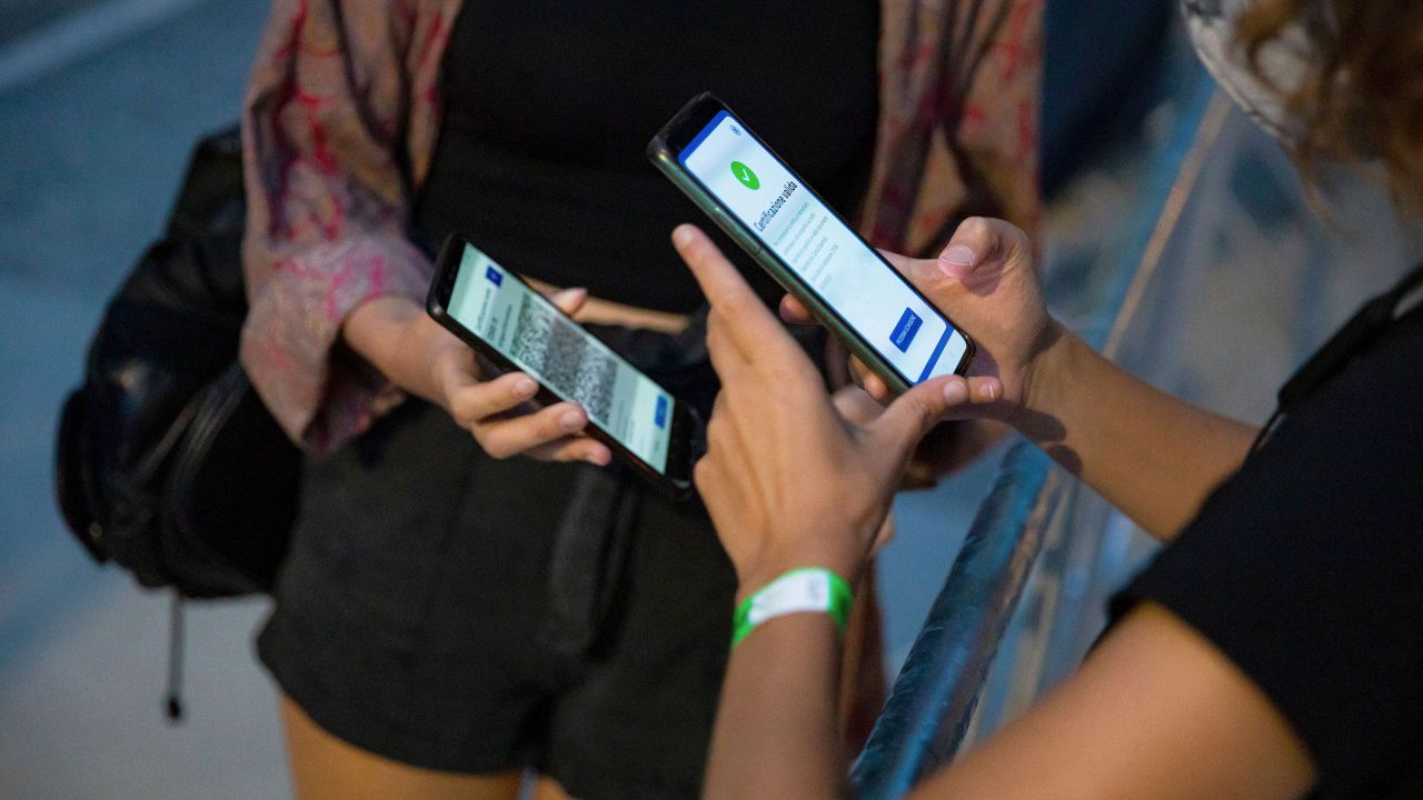 Audience showing their Covid-19 Green Pass Certificates to enter at The Zen Circus concert for Bergamo1000 at Piazzale degli Alpini on August 06, 2021 in Bergamo, Italy. 