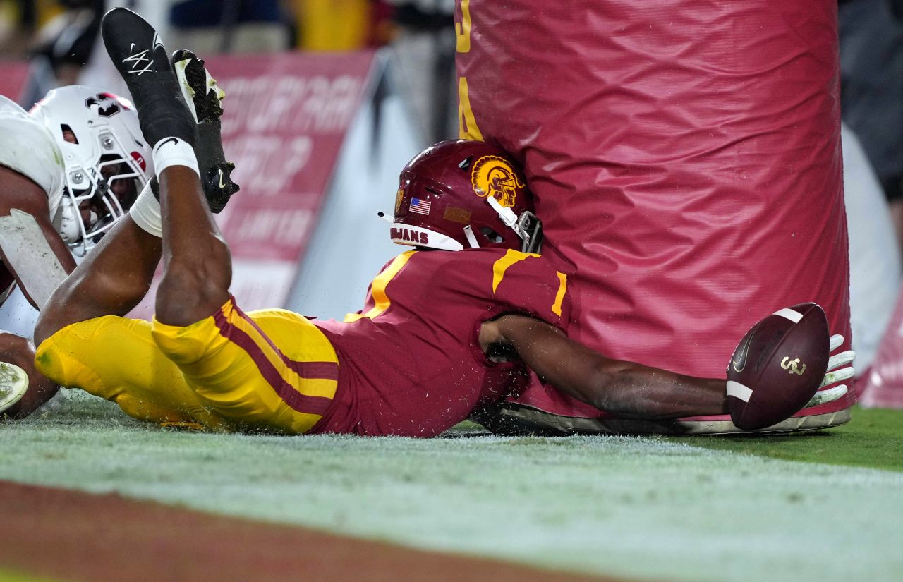 USC wide receiver Gary Bryant Jr. collides with a goal post after trying to pull in a catch against Stanford on Saturday, September 11.