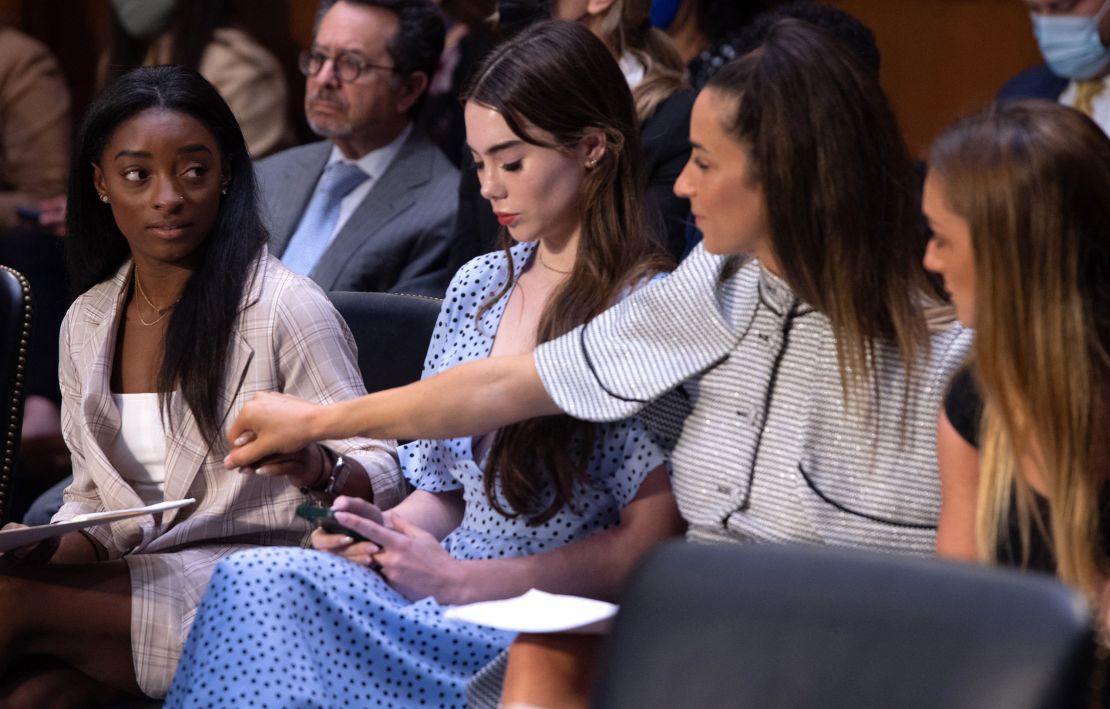 US Olympic gymnasts (L-R) Simone Biles, McKayla Maroney, Aly Raisman and Maggie Nichols arrive to testify during a Senate Judiciary hearing about the Inspector General's report on the FBI handling of the Larry Nassar investigation on September 15.