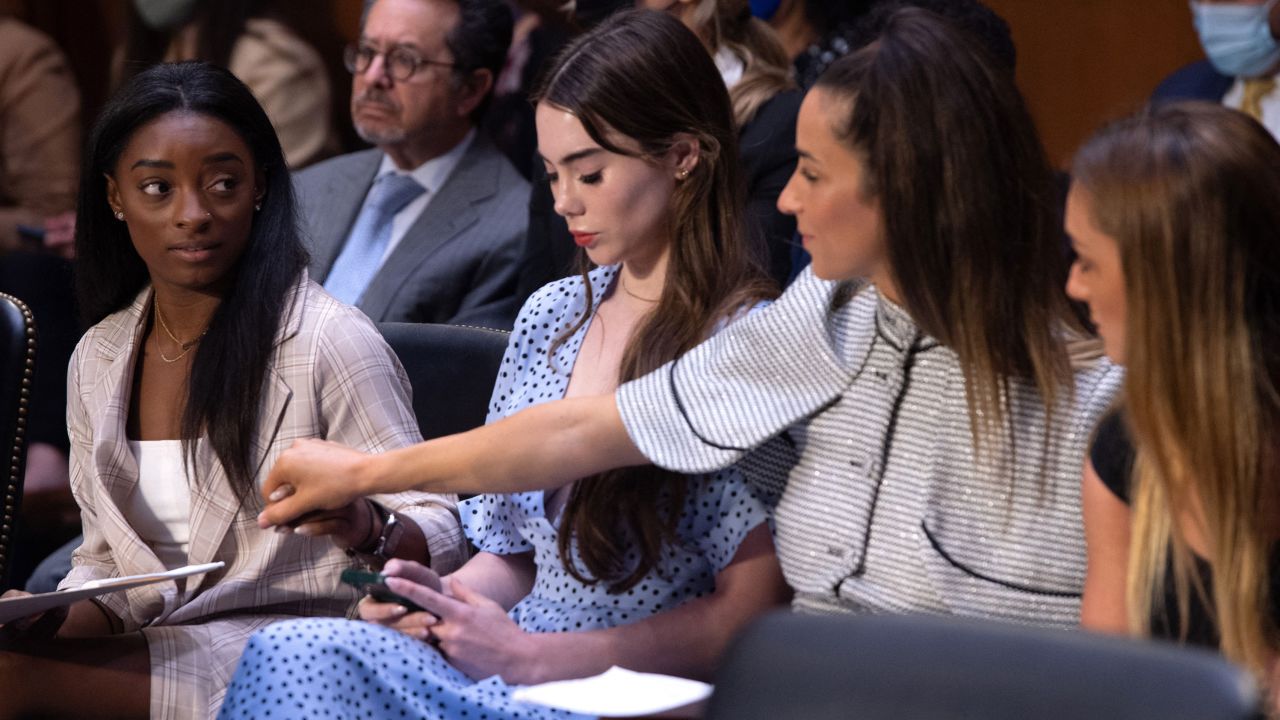 US Olympic gymnasts (L-R) Simone Biles, McKayla Maroney, Aly Raisman and Maggie Nichols arrive to testify during a Senate Judiciary hearing about the Inspector General's report on the FBI handling of the Larry Nassar investigation on September 15.